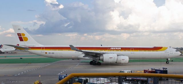 Airbus A340-600 (EC-IZX) - Flashback (Eleven years ago back to 2011) ~~br /IBE's "Mariano Benlliure" (EC-IZX, an A346) is captured (in this snap taken thru a terminal window) as it taxies away from the International Terminal at O'Hare.br /br /* A couple of years later, this one was repainted into the new IBE livery. It continued flying for Iberia until May, 2020, when it was wfu and put in storage at Madrid. As best as I have been able to determine, it is still in storage status there.