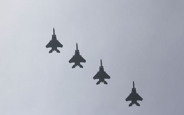 McDonnell Douglas F-15 Eagle — - Four F-15s from 104th Fighter WIng,Massachusetts Air National Guard flying overhead at London International Airport,London,Canada. Taken June19,2009