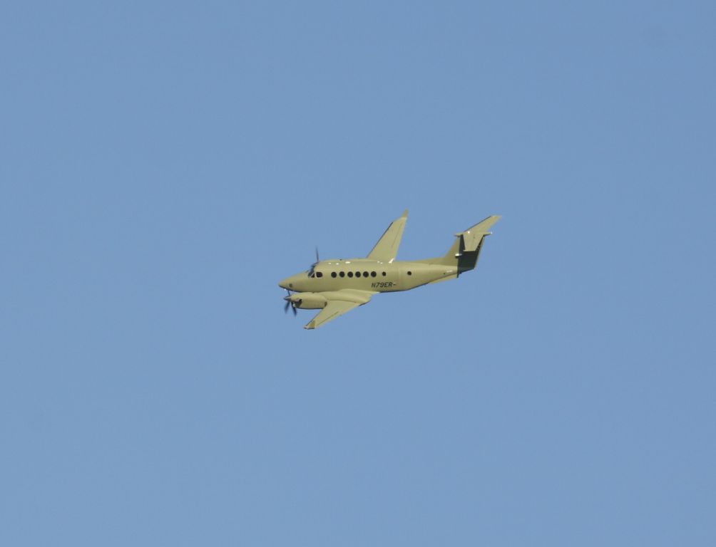 Beechcraft Super King Air 350 (N79ER) - Was photographed in the downwind pattern.