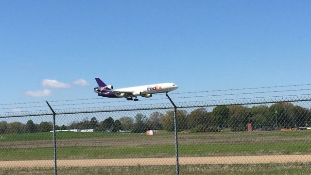 Boeing MD-11 — - Taken from on top of a step ladder on Louis Carithers Drive.