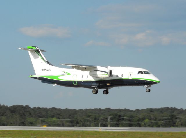 Fairchild Dornier 328JET (N395DC) - Over the numbers for RWY 18