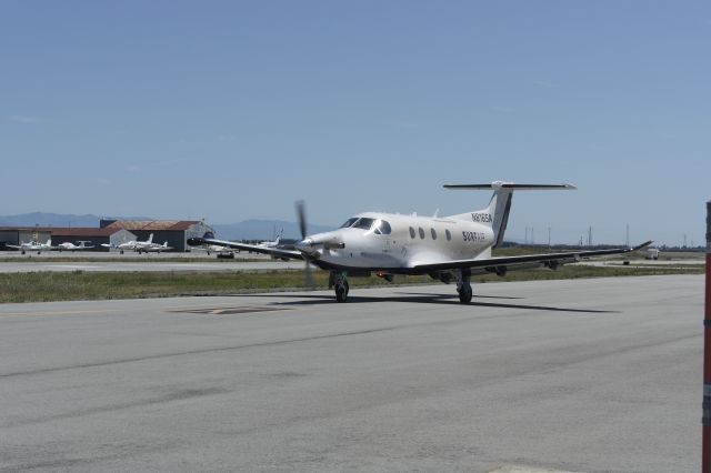 Pilatus PC-12 (N816SA) - Waiting on taxiway for takeoff at San Carlos Airport in San Carlos, California.