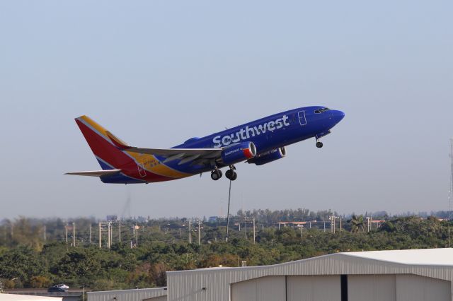 Boeing 737-700 (N770SA) - Southwest Airlines (WN) N770SA B737-7H4 [cn30589]br /Fort Lauderdale (FLL). Southwest Airlines flight WN2333 departs for Orlando International (MCO). br /Taken from Terminal 1 car park roof level br /2018 04 07br /a rel=nofollow href=http://alphayankee.smugmug.com/Airlines-and-Airliners-Portfolio/Airlines/AmericasAirlines/Southwest-Airlines-WNhttps://alphayankee.smugmug.com/Airlines-and-Airliners-Portfolio/Airlines/AmericasAirlines/Southwest-Airlines-WN/a