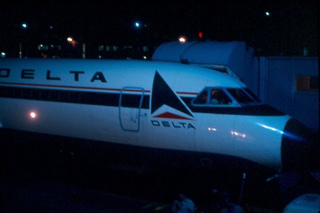 — — - Nite shot of Delta Convair 880 at pier C, KBWI.  Circa 1968-70