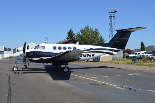 Beechcraft Super King Air 200 (N169RW) - Parked on the ramp visiting. Not too often Independence (7S5) gets larger corporate aircraft such as this.