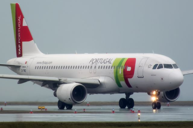 Airbus A320 (CS-TNQ) - Heavy raining bad weather conditions.