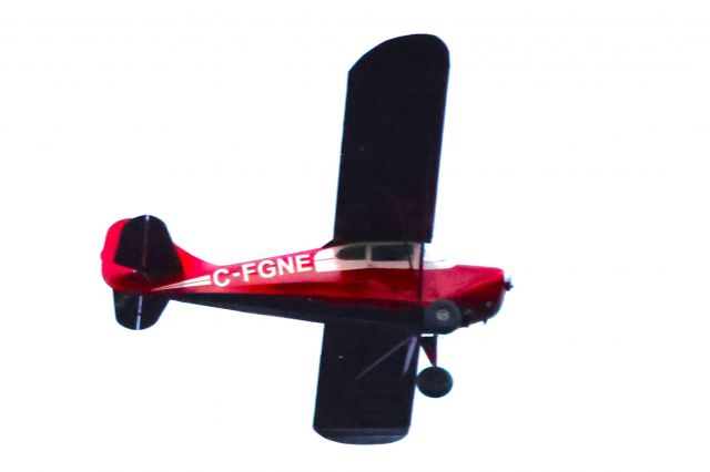 C-FGNE — - C-FGNE Aeronca Chief 11-BC. Survolant le fleuve St-Laurent QC. à Lavaltrie le 14-05-2024 à 20:18.