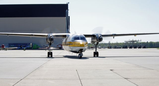 FAIRCHILD HILLER FH-227 (N51607) - McGUIRE AIR FORCE BASE, WRIGHTSTOWN, NEW JERSEY, USA-MAY 11, 2014: The United States Army Parachute Team, the Golden Knights, prepares for take off in their Fokker F-27 at the 2014 Open House and Air Show.