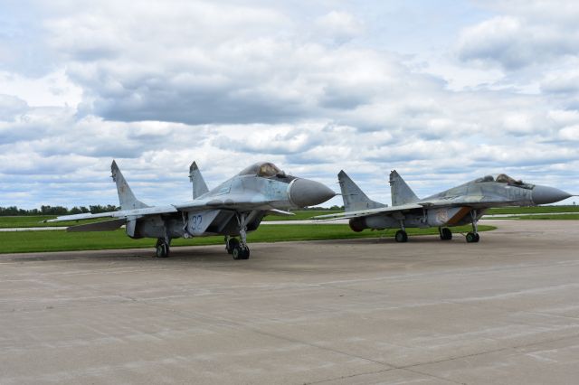 — — - A couple of MiG 29s hanging out on the ramp