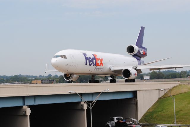 Boeing MD-11 (N573FE) - The captain of this flight waived at me as this beast passes by!