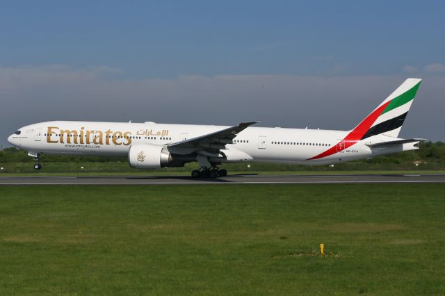 BOEING 777-300ER (A6-ECA) - EK22, a B77W replacing the usual A380 for a few weeks, departs to Dubai.