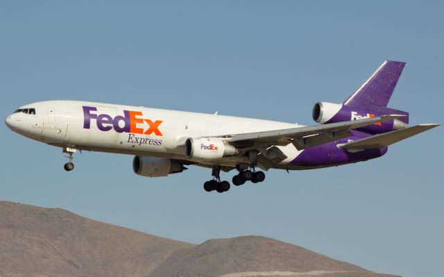 McDonnell Douglas DC-10 (N307FE) - FDXs "Erin Lee," operating as Flt. 723, the weekly Saturday arrival from KMEM, passes Rattlesnake Mountain on s/final to Renos runway 34L.