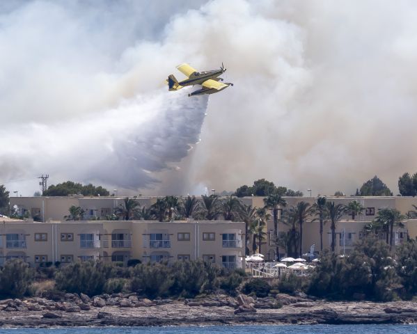 — — - Fire fighting at San Antonio Ibiza, island east of Spain today March 13, 2013. Olympus OMD 40-150 2.8 equivalent to 300mm in old money!