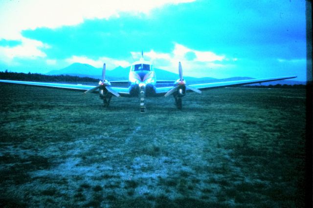 VH-GVE — - Southern Airlines Dove with a puncture on grass RWY 28, circa 1957