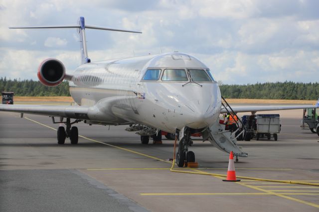 Canadair Regional Jet CRJ-900 (ES-ACM) - Scandinavian CRJ900LR operated by Xfly at Göteborg Landvetter.br /br /Picture taken with:br /Canon EOS 700Dbr /Canon 18-135 STM