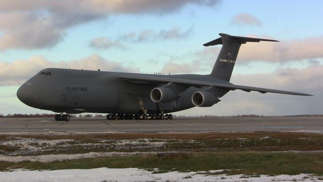 Lockheed C-5 Galaxy — - A Lockheed C-5M Super Galaxy sits on the tarmac at Gander International.