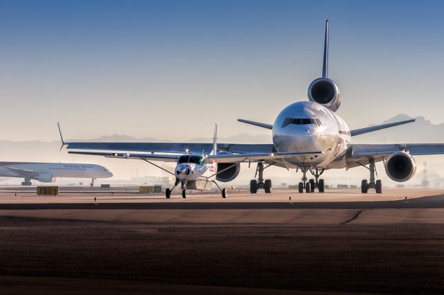 Boeing MD-11 — - Early morning holiday cargo traffic at KPHX.