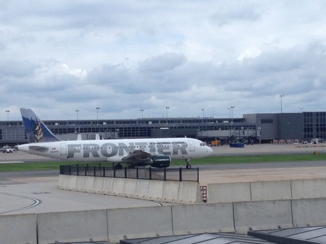 Airbus A320 (N209FR) - The flight was taxing towards the Z gates at the Washington Dulles international Airport. This picture was photographed near the check-in desks.