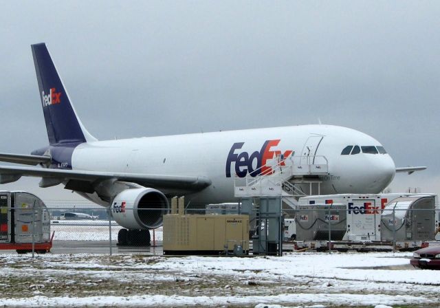 Airbus A300F4-600 (N744FD) - The FedEx ramp at Shreveport Regional. Lots of clutter in the photo but there is snow on the ground in Shreveport. It just doesnt snow that often down here in Louisiana!