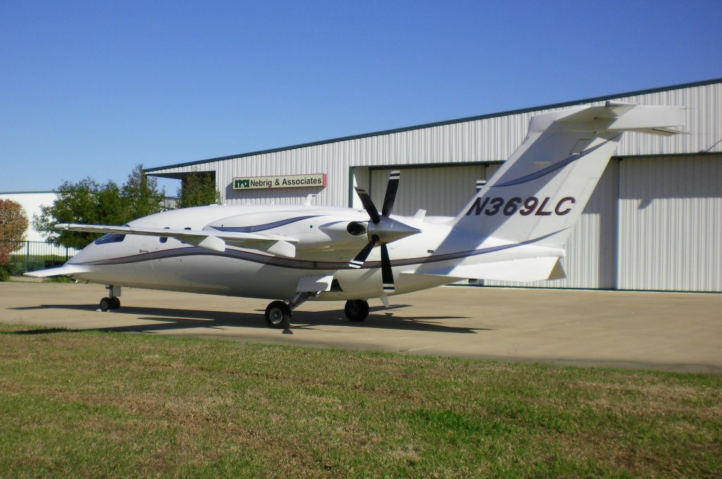 Piaggio P.180 Avanti (N369LC) - Piaggio Avanti N369LC parked in front of the Nebrig Associates hangar at Denton, TX (KDTO)but also seen in Roswell & Shreveport.  Completion Center for Piaggio Aero is Denton, Texas (KDTO). For more info, see Ciao Avanti at: http://www.planeandpilotmag.com/aircraft/pilot-reports/piaggio-aero/ciao-avanti.html?tmpl=component&print=1&page=