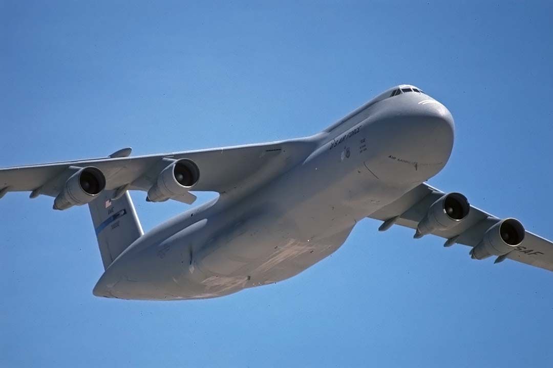 Lockheed C-5 Galaxy (87-0032) - Lockheed C-5B 87-0032 from Travis AFB makes a pass over the Nellis Air Force Base Golden Air Tattoo on April 25, 1997.