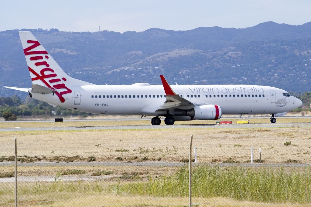 Boeing 737-800 (VH-VOK) - About to put down on runway 05. Friday 19th April 2013.