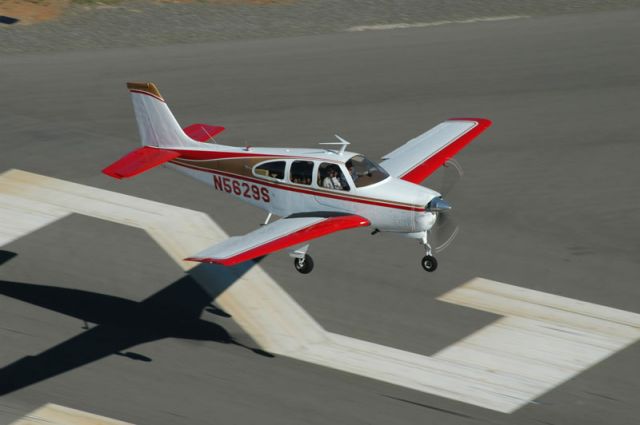 Beechcraft Bonanza (33) (N5629S) - Landing on runway 25 at Auburn, CA (KAUN). Photo by Andy Robinson.