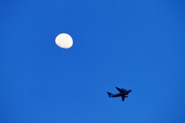 — — - C17A FLYING OVER WAIKIKI