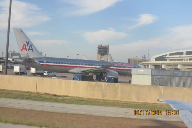 Boeing 757-200 (N688AA) - This plane would be sitting here for another 4 days.  It would depart to San Diego, California at 1123AM on October 22, 2015.  Picture taken October 18, 2015