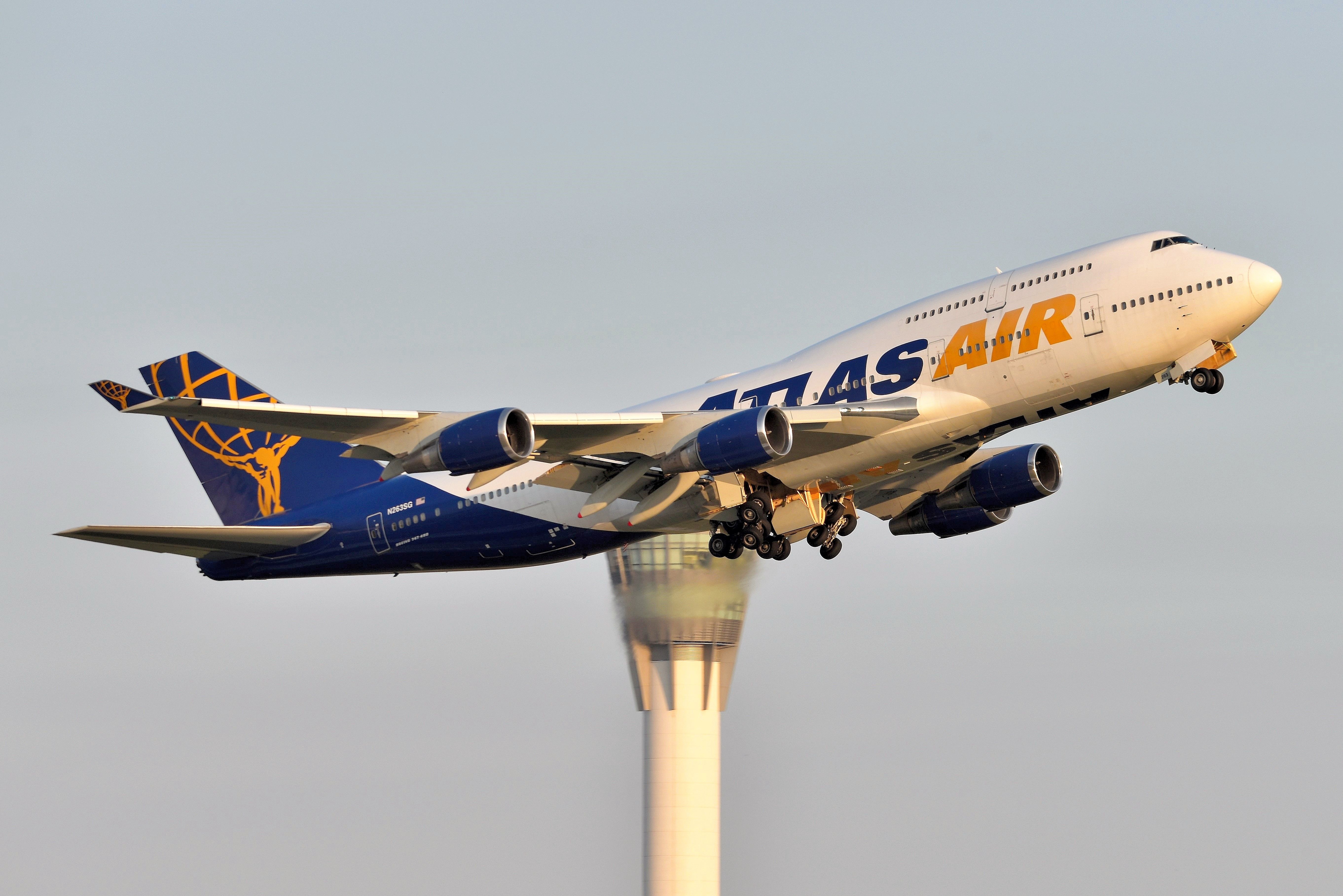 Boeing 747-400 (N263SG) - Taking the Jacksonville Jaguars back to JAX after their loss to the Indianapolis Colts. 23-R departure at sunset. 10-16-2022