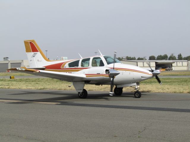 Beechcraft 55 Baron (N4373W) - Taxiing to ramp