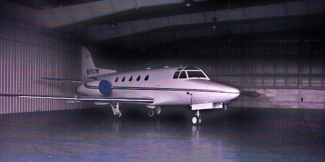 North American Sabreliner (N117JW) - Shown here is an unposted photo from 2003 of a 1981 North American Rockwell NA-465 Sabreliner 65. According to the photo property details appears to have been taken on a 8 megapixel camera. Jet was located at the time in a hangar at the former Jet Center at PNE. 