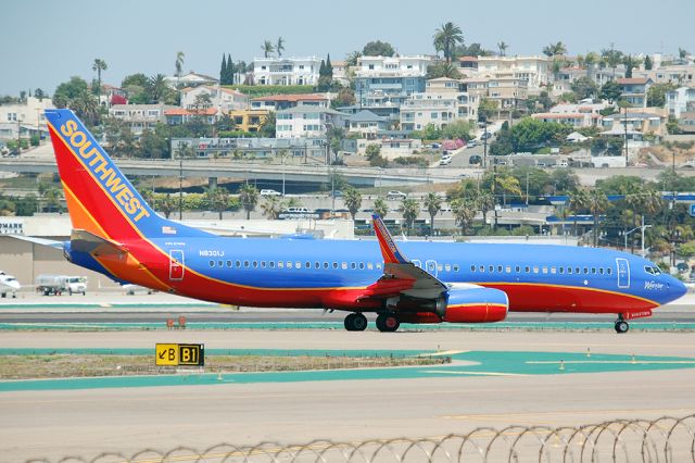 Boeing 737-800 (N8301J) - Warrior One waiting in line for takeoff from KSAN