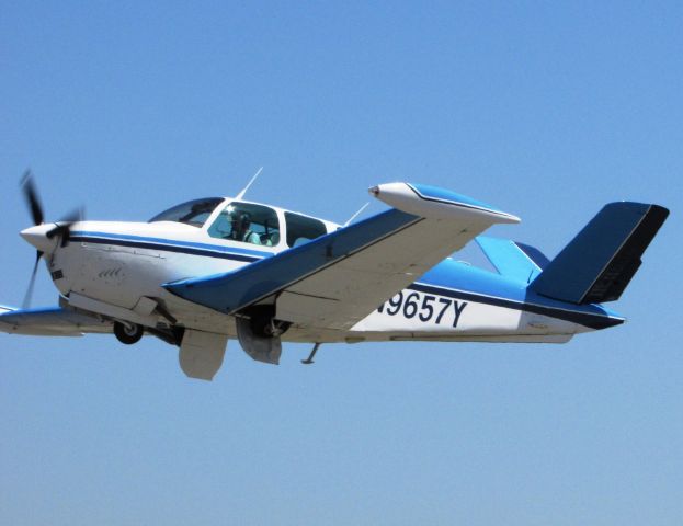 Beechcraft 35 Bonanza (N9657Y) - Taking off from RWY 24