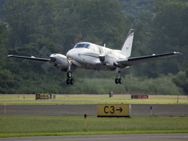 Beechcraft King Air 100 (N24EM) - Take off runway 26.