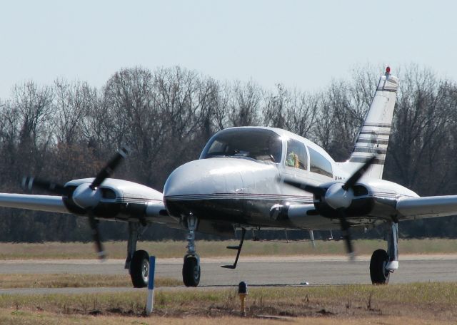 Cessna 310 (N3844C) - Taxiing at Downtown Shreveport.