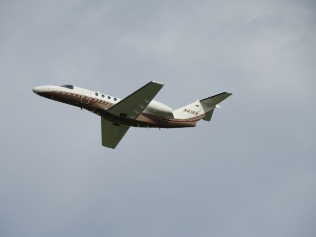 Cessna Citation CJ4 (N41KN) - Just a basic photo of N41KN departing CAK. I had the opportunity to take a look at this aircraft from the inside thanks to a member of crew. A very nice new aircraft indeed.  