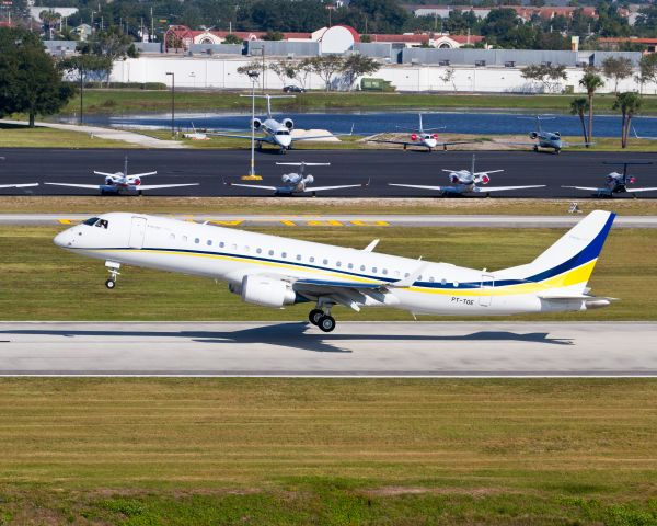 Embraer ERJ-190 (PT-TOE) - Someone getting a test ride in a brand new Embraer Lineage 1000 before the static demo for the 2012 NBAA show.