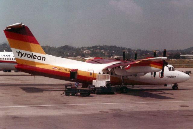 De Havilland Canada Dash 7 (OE-HLS) - Seen here in May-85.br /br /Reregistered OE-LLS then I-FARB.br /Broken up in Mar-01 at GCI.