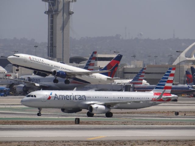 Airbus A321 — - At LAX, Standing at Imperial hill.