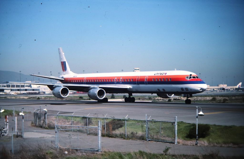 McDonnell Douglas DC-8-70 (N8072U) - KSFO - CN: 45812 LN:277 on taxi to Runway 1R at San Francisco. Most likely headed to Chicago, this DC-8-71 shows new as a -61 and damaged before delivery 12/31/1966. United took delv of this jet Feb 17th, 1968 and was converted in 1984 to a -71. This photo was taken along Airport Rd when the dirt parking lots were here and we could park here for hours. Photo date apprx Summer late 1980s or 1990. This was the best slide out of 10 that wasnt real dusty. Color slide converted to digital.