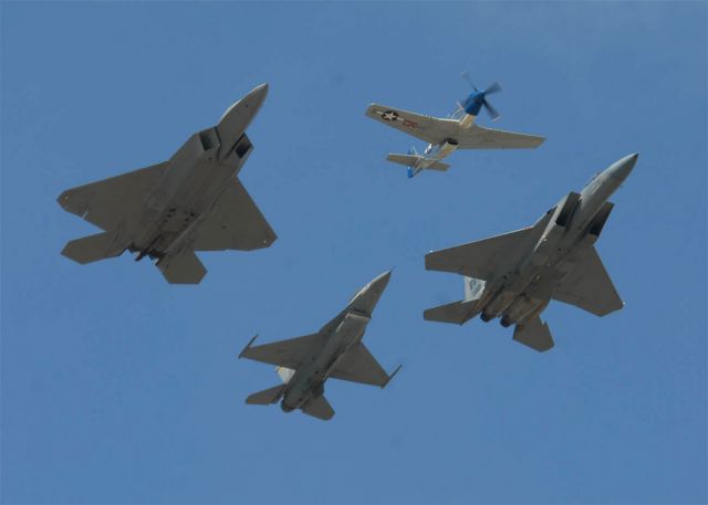 NL5427V — - P-51D leads F-15C, F-16C and a F-22A