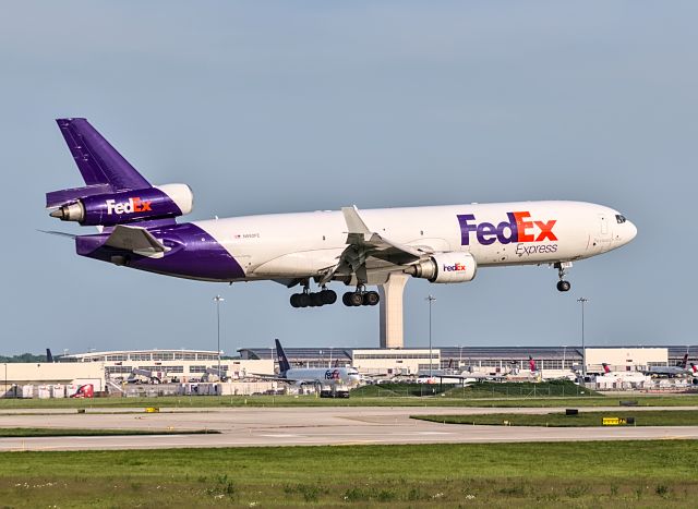 Boeing MD-11 (N592FE) - FedEx 505 on final for runway 22R at DTW on a Saturday evening.