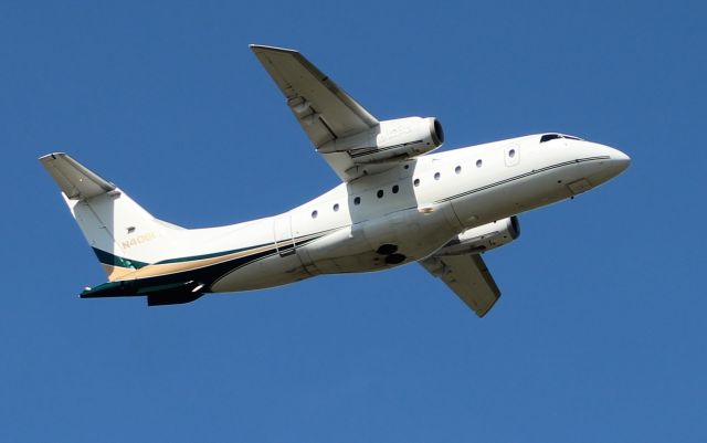 Fairchild Dornier 328JET (N406FJ) - An Ultimate Jetcharters Dornier Do328-300 after departing Runway 5 at Anniston Regional Airport, AL - October 12, 2017.