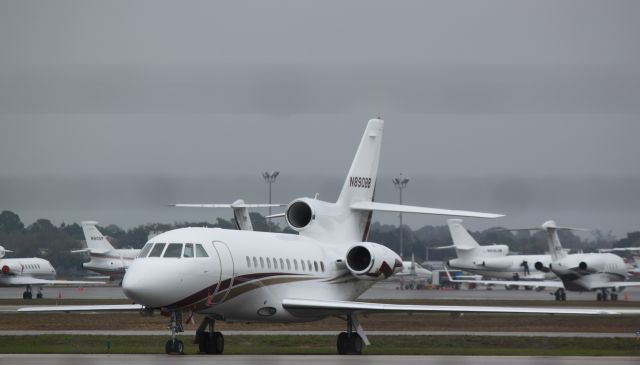 Dassault Falcon 900 (N890BB) - On the ground during some mild rain at APF on 2/11/2011