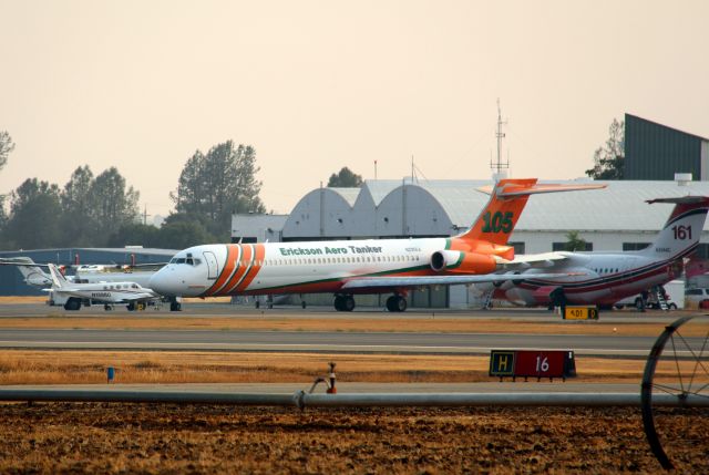 McDonnell Douglas MD-87 (N295EA) - KRDD - Erickson Air Tanker 105, love that murky brown haze during fire season! This jet delivered new to Iberia Airlines of Spain, then flew with Scandanavian Airlines and now Erickson Aero Tankers as a fire bomber.br /br /br /CN:53211 Line Number 1874br /Aircraft Type McDonnell Douglas MD-87br /irst Flight 24.May 1991br /Delv new to Spains Iberia Airlines