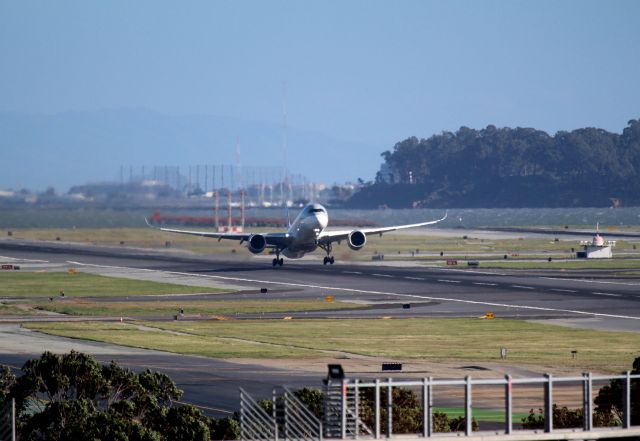 Airbus A350-1000 (A7-ANP) - KSFO - 28L Departure for QATAR Flt 738 with the A350-1000 for VDOH / OTHH into strong headwinds this day at San Francisco. All wheels off the ground at the Runway 1LR intersection and the engine noise pushing against the wind was cool to hear. This is probably my 1st A350-1000 photo.