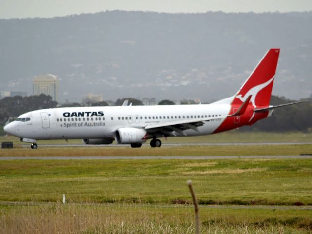 Boeing 737-800 (VH-VYF) - On taxi-way heading for Terminal 1 after landing on runway 23. Friday 5th October 2012.