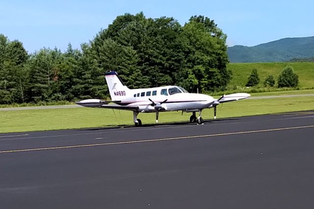 Cessna 402 (N4169G) - Plane spotting on a bike ride in the North Carolina mountains. 