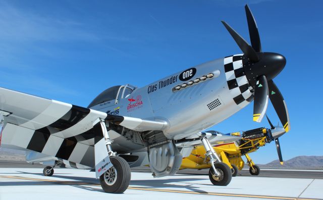 PAPA 51 Thunder Mustang (N151CR) - A pair of Thunder Mustangs posing for a Portrait Day photo. "Clas Thunder One" (N151CR) with "Swiss Thunder" (167BP) in the background.